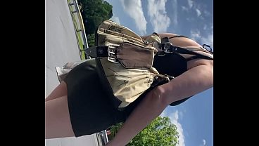 Wifeyy short skirt walking through parking lot