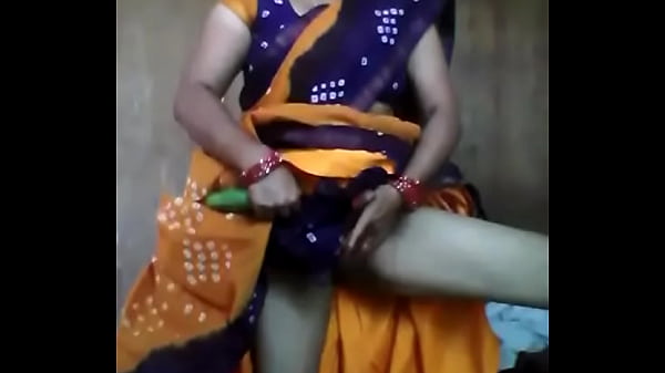 Indian lady is using cucumber inside her vagina pussy
