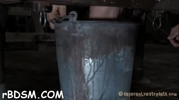 Clamped up girl gets her fuck holes t.