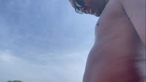Having fun on the beach with this chubby black guy eating me a lot