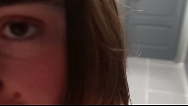 After the gym, in the shower: a brunette with small breasts sucks and gives herself doggy style.