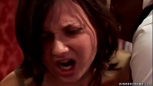 Tied lesbians kissing at bdsm party