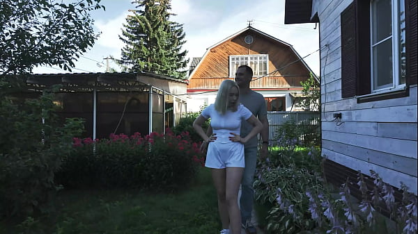 A slender milf without panties, with a gorgeous ass under a short skirt, goes to Christmas. Foot fetish with peeping on a public street. Voyeur outdoor.