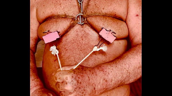 Seniormasochist pulls nipple clamps off