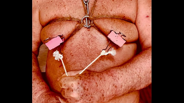 Seniormasochist pulls nipple clamps off