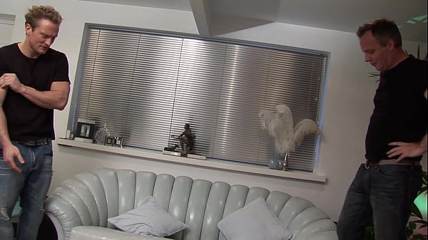 Sexy brunette with big boobs, Sahara Knite, dressed in provocative fishnet lingerie, gets...