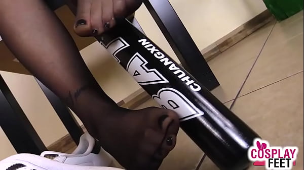 Download Video - Harley Quinn in black pantyhose teases with her feet