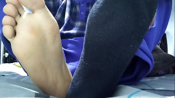 Download Video - Playing with my black socks and barefeet before rest