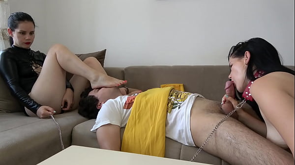 Anna's double domination she orders the slave to kiss her feet and the slave girl to give a blowjob