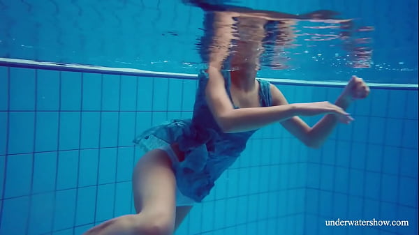 Beautiful ginger hairy pussy underwater