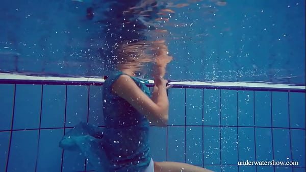 Beautiful ginger hairy pussy underwater