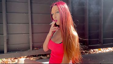 Italian Long hair milf smoking a cigarette outdoor