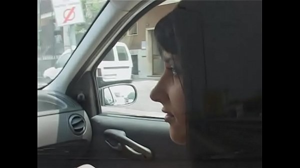 Couple has fun in the car
