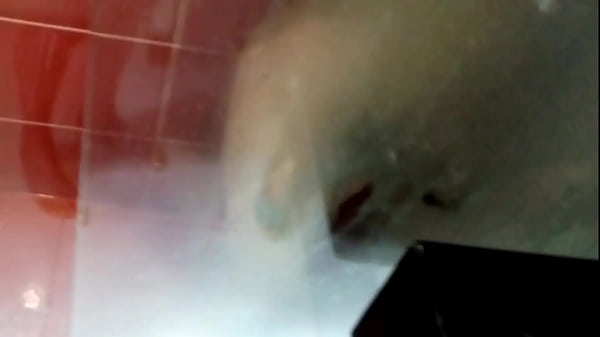 Under the shower. Natural breasts 2 min