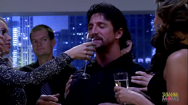 Two guys get their dicks sucked before fucking three milfs on the floor