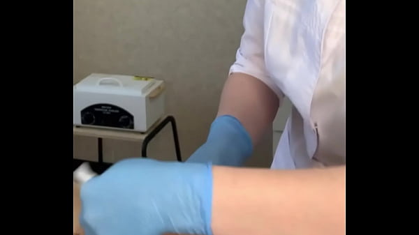 Download Video - The patient CUM powerfully during the examination procedure in the doctor's hands