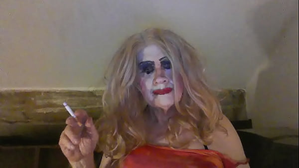 Download Video - Slutty Tranny&comma; Sarah&comma; Smokes and Inserts Dildo Into Her Lady Hole