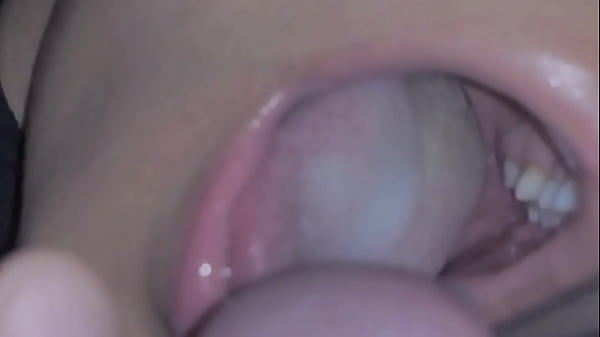 She feels my fresh cum slowly running into her mouth