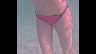 Amateur long legs perfect body girl's relaxing underwater swimming 5 sec