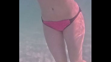 Amateur long legs perfect body girl's relaxing underwater swimming