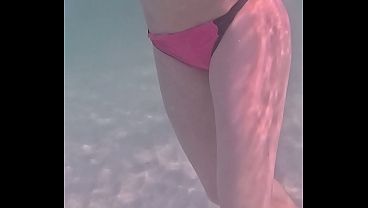 Amateur long legs perfect body girl's relaxing underwater swimming
