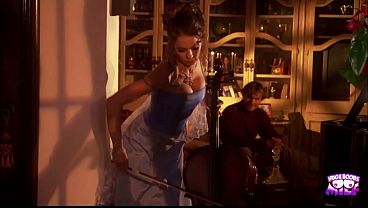 An artistic brunette with fake breasts getting her pussy eaten and penetrated by a guy