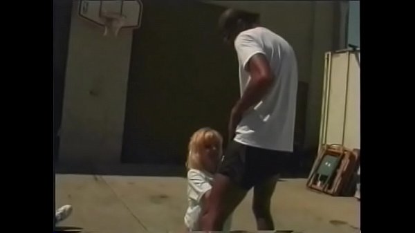 Blonde whore sucks and fucks huge black cock on a rooftop