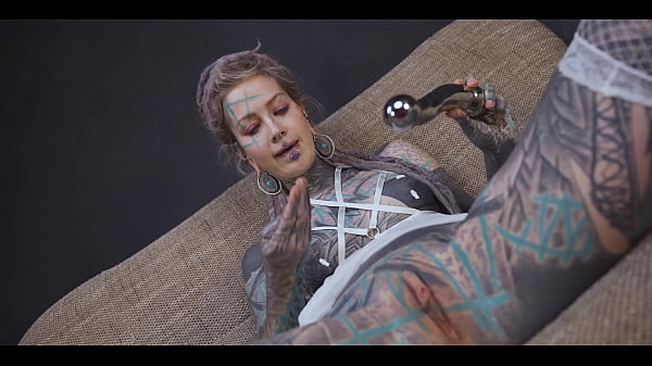 Tattoo girl gets a stainless steel dildo to shove up her ass