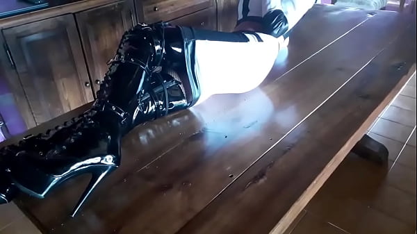 On a table showing my black boots over the knee 92 sec