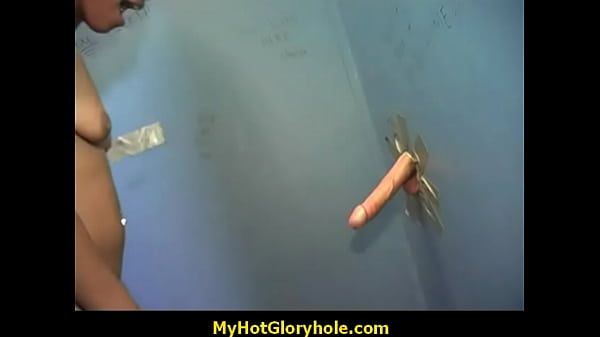 Gloryhole - Ebony sucking a strangers hard cock through the hole in the wall 21