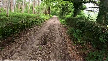 I see a girl cycling in the woods and when I go to urinate she helps me by giving me a blowjob in public