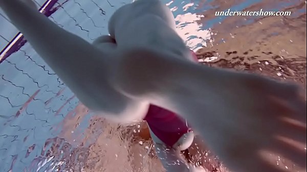 Fat teen underwater shows her bouncing body