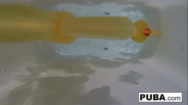 Sexy Nadia takes a bath with some rubber duckies
