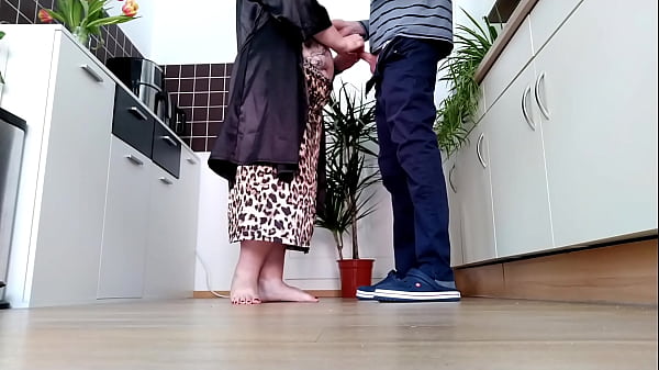 Doggystyle in the kitchen with a curvy milf with natural tits