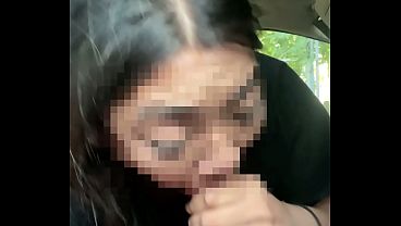 Asian giving head to BBC while driving