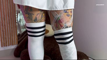 The girl in long stockings bites the tough guy