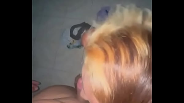 On the floor sucking dick