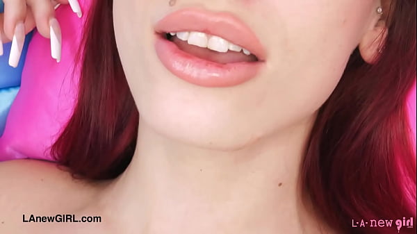 Red haired model shows her sexy body