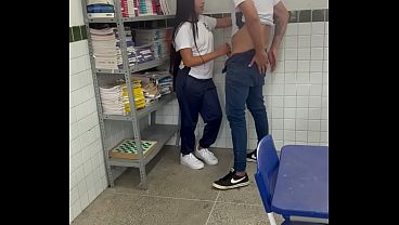 Hot 18-year-old young woman from school getting a big cock from her well-endowed friend in the classroom.