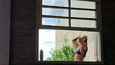 Taking a bath with the danger of the neighbor peeking in.