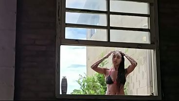 Taking a bath with the danger of the neighbor peeking in.