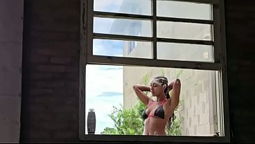 Taking a bath with the danger of the neighbor peeking in.