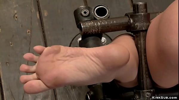 Gagged slave in extreme device bondage