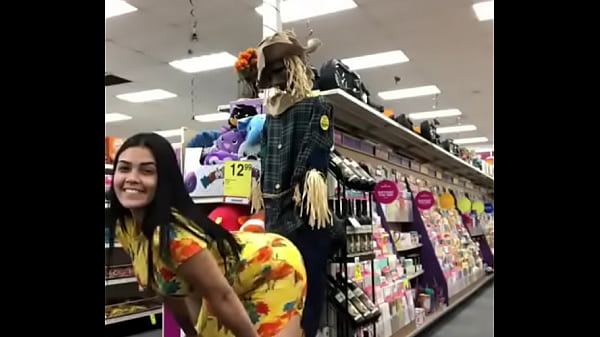 Brunette dancing in store