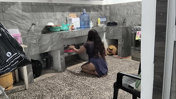 My stepsister got stuck in the kitchen while cleaning, I helped her and filmed her brown buttocks.