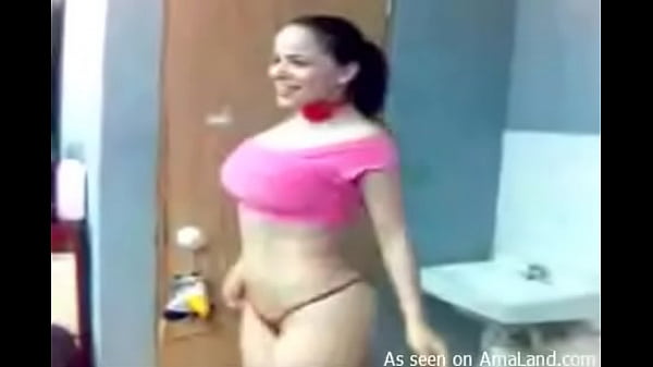 Busty Latina in pink strips in the bathroom