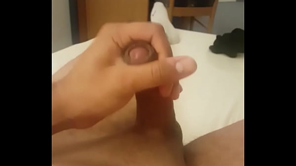 Spraying sexy cock on the belly