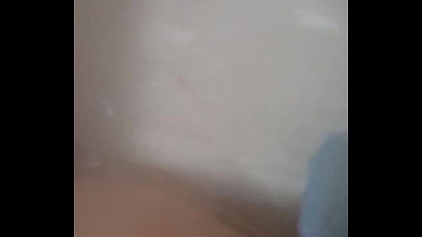 Playing in the tub with my toy