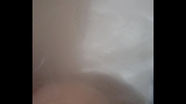 Playing in the tub with my toy