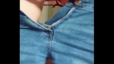 Outside on the beach with tourists, I get my cock jerked off by a beautiful MILF with a pierced clit and I cum in her thong before continuing our walk